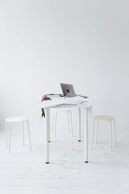 A modern workspace highlighting a laptop, tablet, and smartphones, well suited for technology and freelance use.